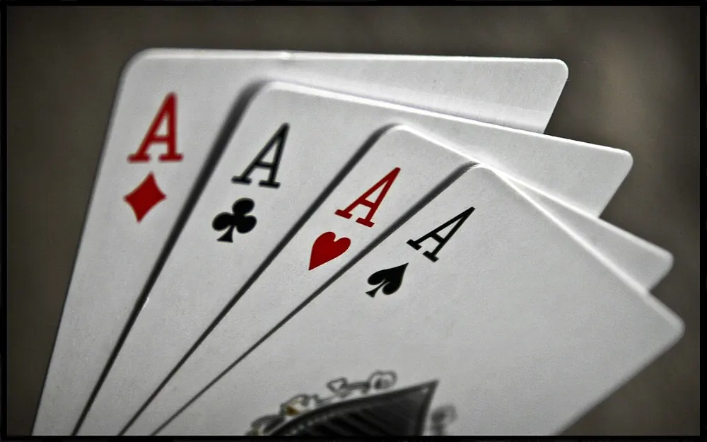 baccarat tips and tricks reddit - four aces fanned out on a table