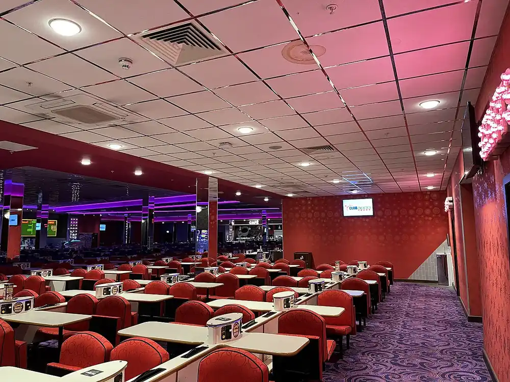 Empty bingo hall with tables and chairs, illustrating e-bingo and bingo halls - bingo online philippines real money