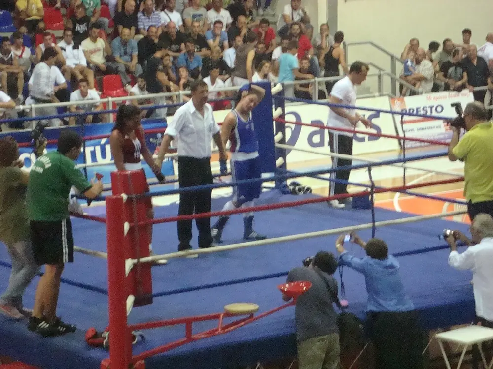 Amateur boxing match in the ring, judging ko versus decision - boxing method of victory betting