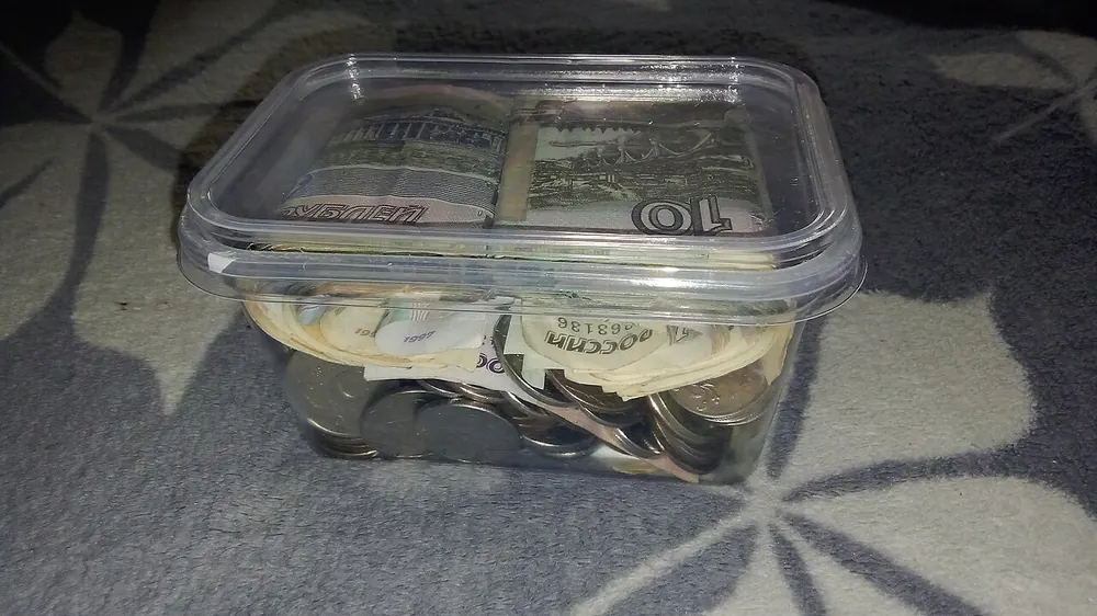 cashback casino philippines - a clear container of saved coins