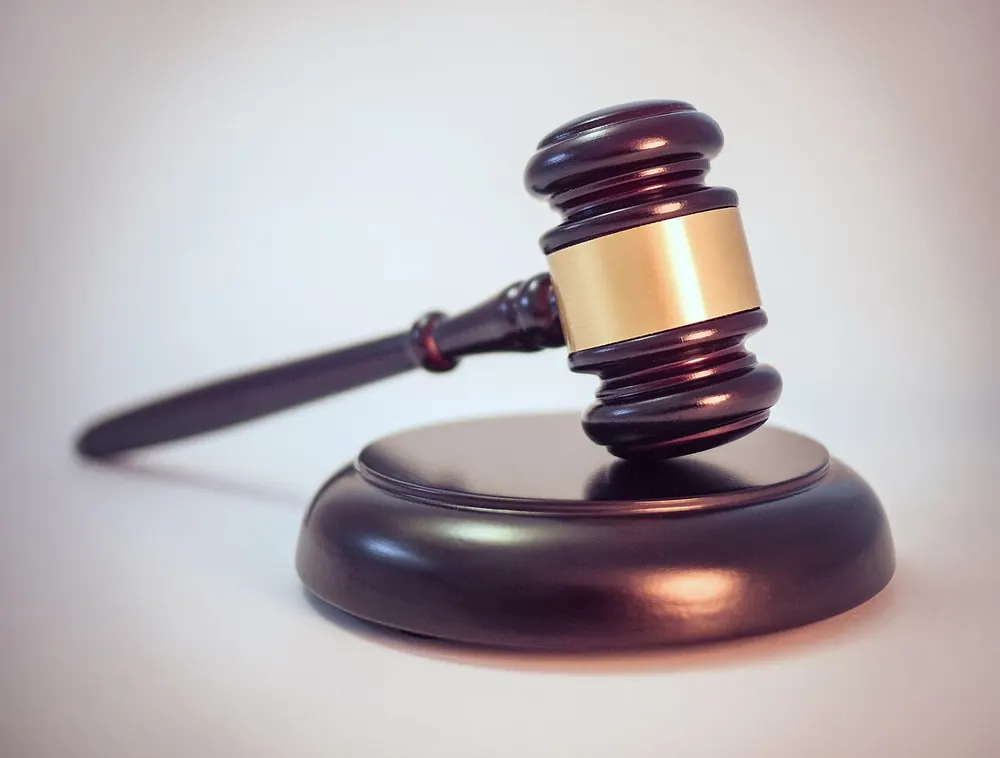 Judge's gavel on a sound block, representing eo no. 9 and philippine cockfighting law - cockfighting ban philippines alternatives