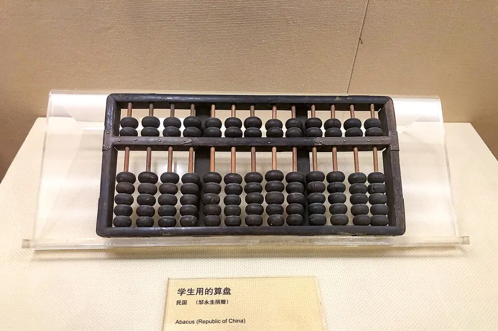 Traditional abacus in a museum display - color game odds probability