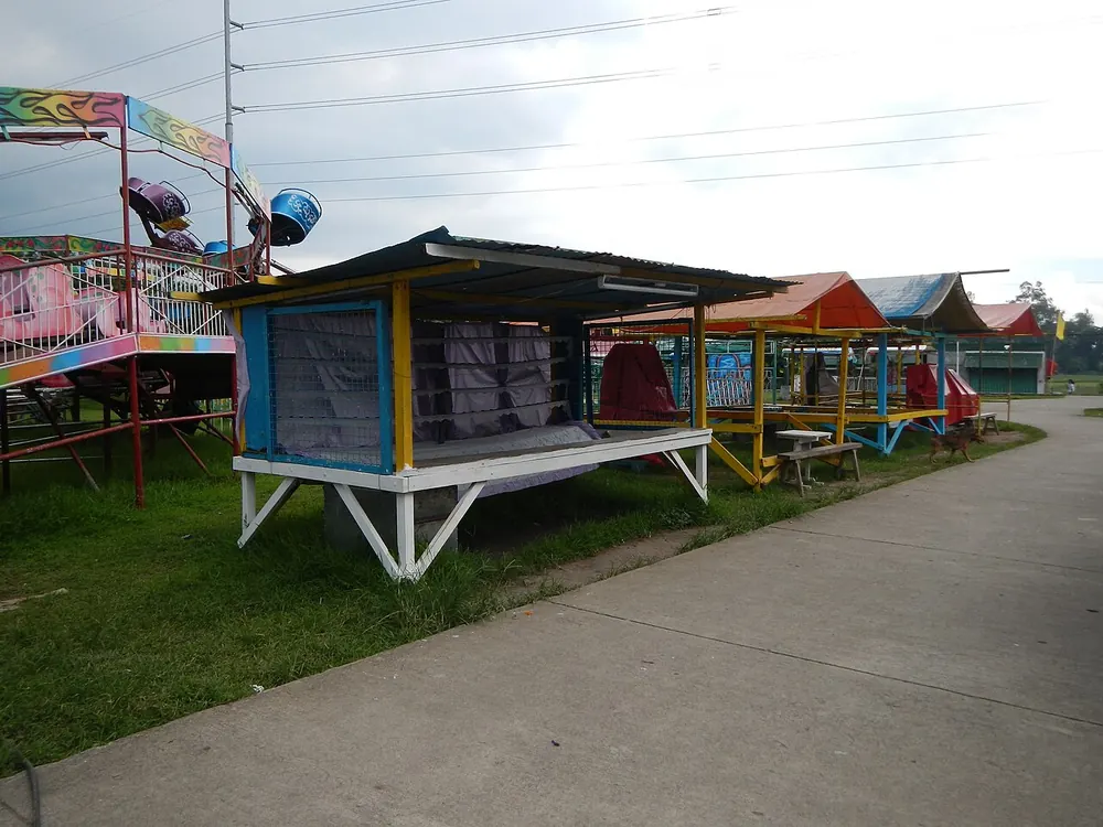 color game perya tips and tricks - a small fair booth at a Philippine town fiesta