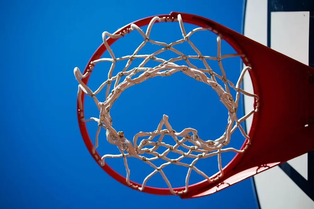 Close-up of a basketball hoop and net from below - gilas pilipinas odds
