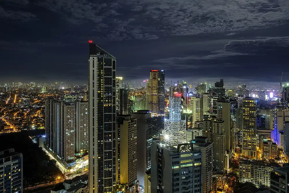 how to buy usdt in binance using gcash - Makati skyline at night, Philippines