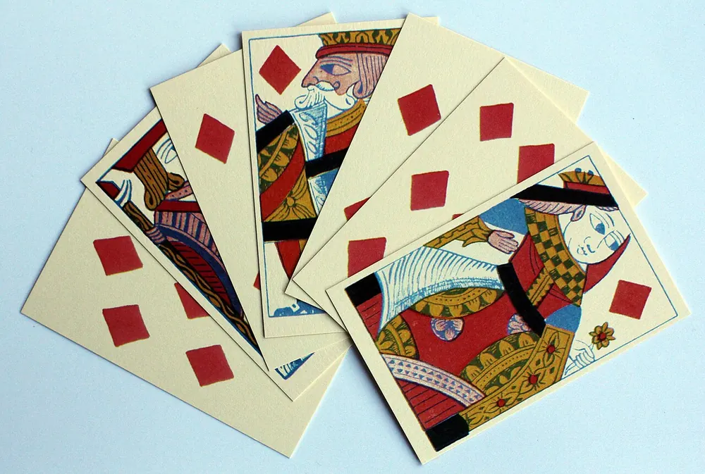 lucky 9 rules - Fan of antique playing cards