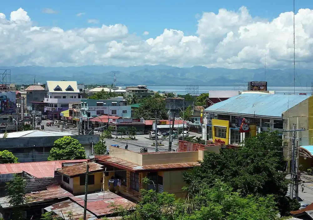 Rooftops of general santos city under a blue sky - manny pacquiao betting odds