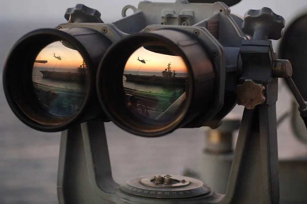 Binoculars pointed at the horizon, like looking ahead to championship futures - nba finals odds philippines