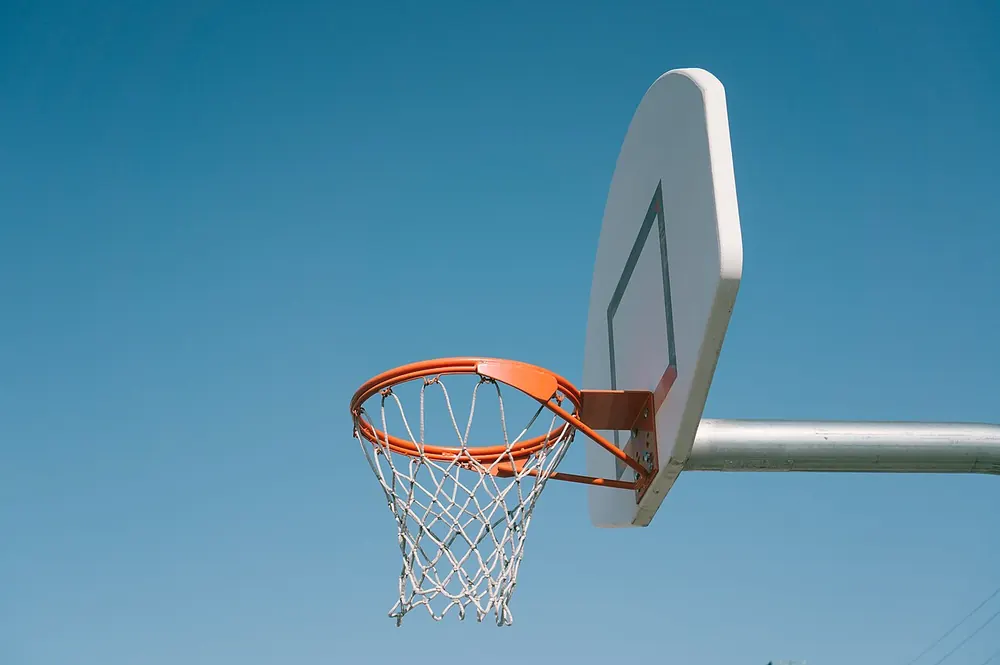 nba player props philippines - a basketball hoop and net against the sky
