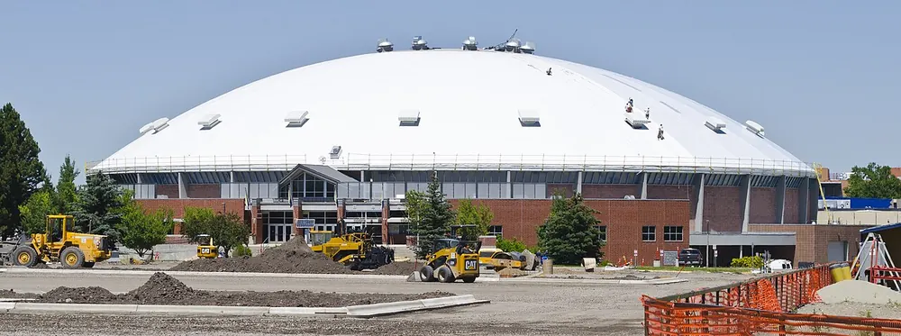 ncaa philippines betting odds - Domed college arena exterior under a clear sky