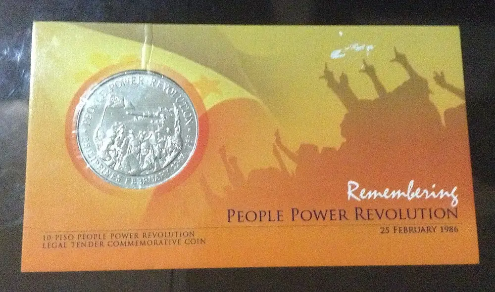 Commemorative philippine peso coin in its folder - paano mag cash out ng usdt sa gcash