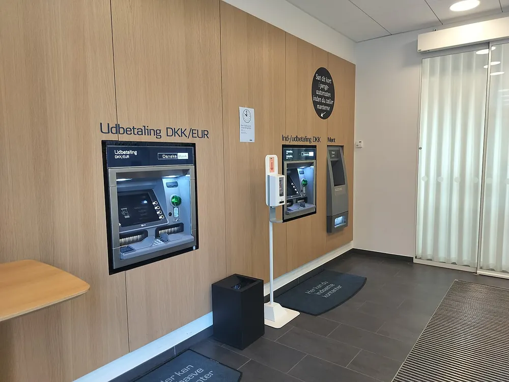 paano mag withdraw sa online casino - an ATM inside a bank lobby