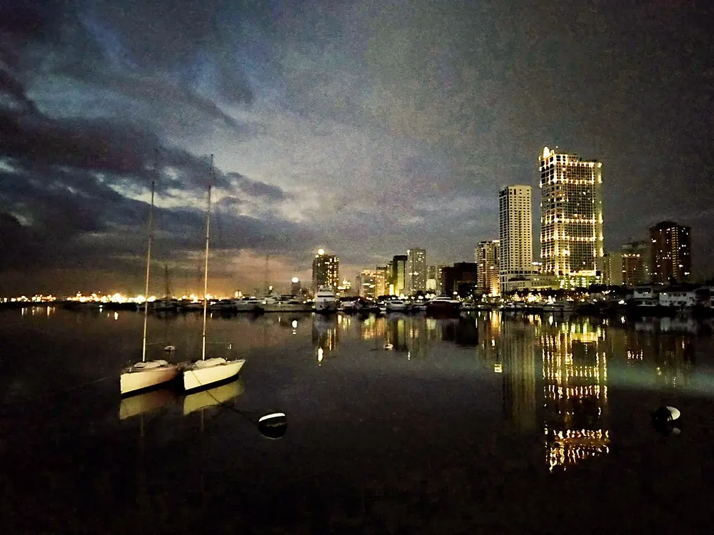 pagcor online casino list 2026 - Manila Bay skyline at night, home to many PAGCOR-licensed resort casinos