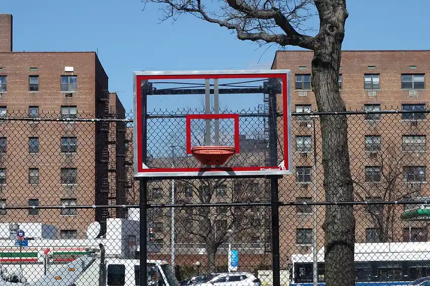 pba commissioner's cup odds - Basketball backboard and rim on an outdoor court, illustrating PBA Commissioner's Cup odds