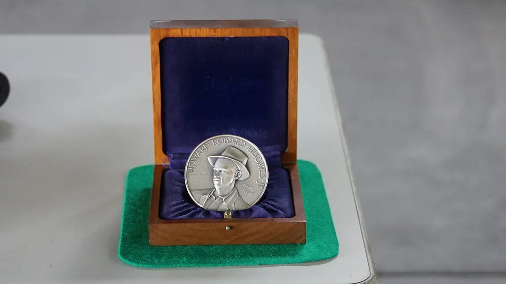 pba mvp odds - Silver award medal in a presentation case, illustrating PBA MVP odds