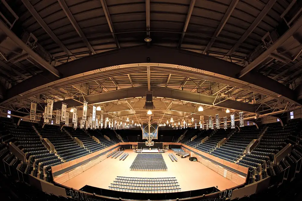 pba odds today governors cup - Empty indoor basketball arena with wooden roof, illustrating PBA Governors' Cup odds today