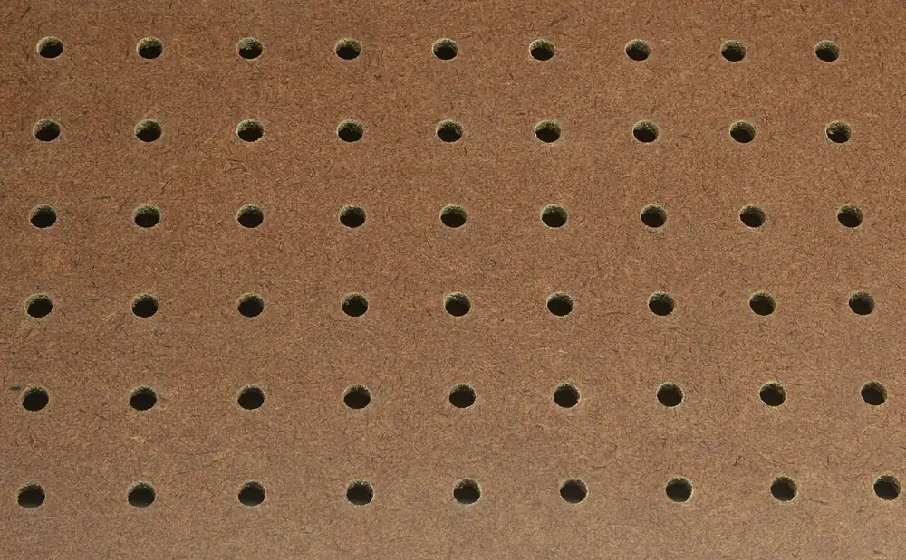 plinko casino game - Pegboard with evenly spaced holes, like a Plinko casino game board