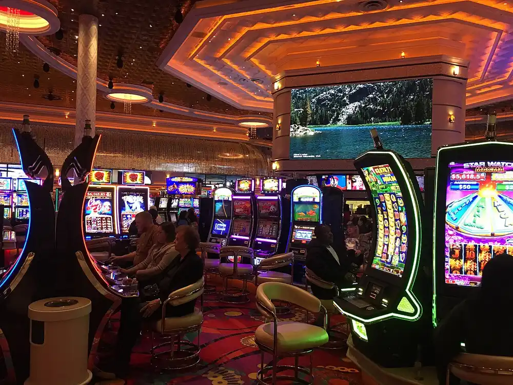 scatter slot meaning - Casino floor with rows of video slot machines