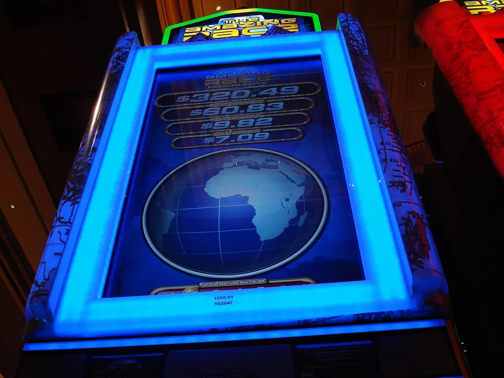 Glowing blue electronic gaming machine - scatter slot meaning