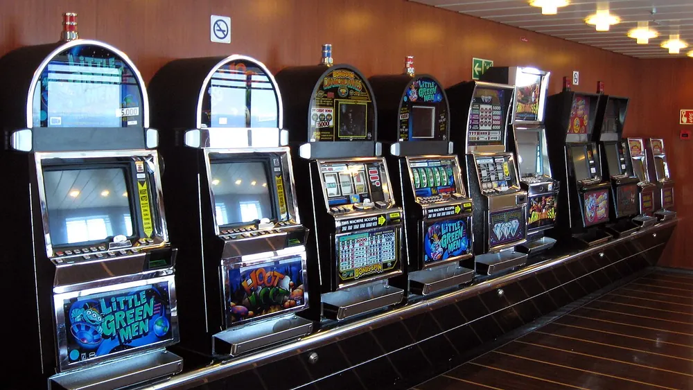 slot rtp meaning - Row of slot machines on a casino floor