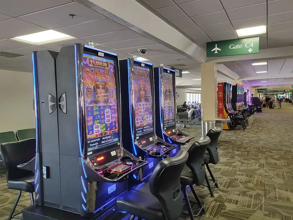 Slot machines in an airport lounge - slot rtp meaning