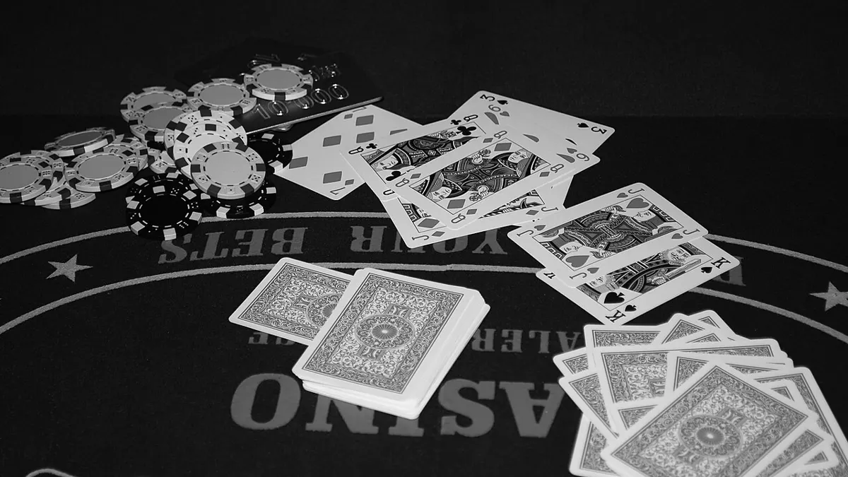 Poker cards and chips - pusoy rules