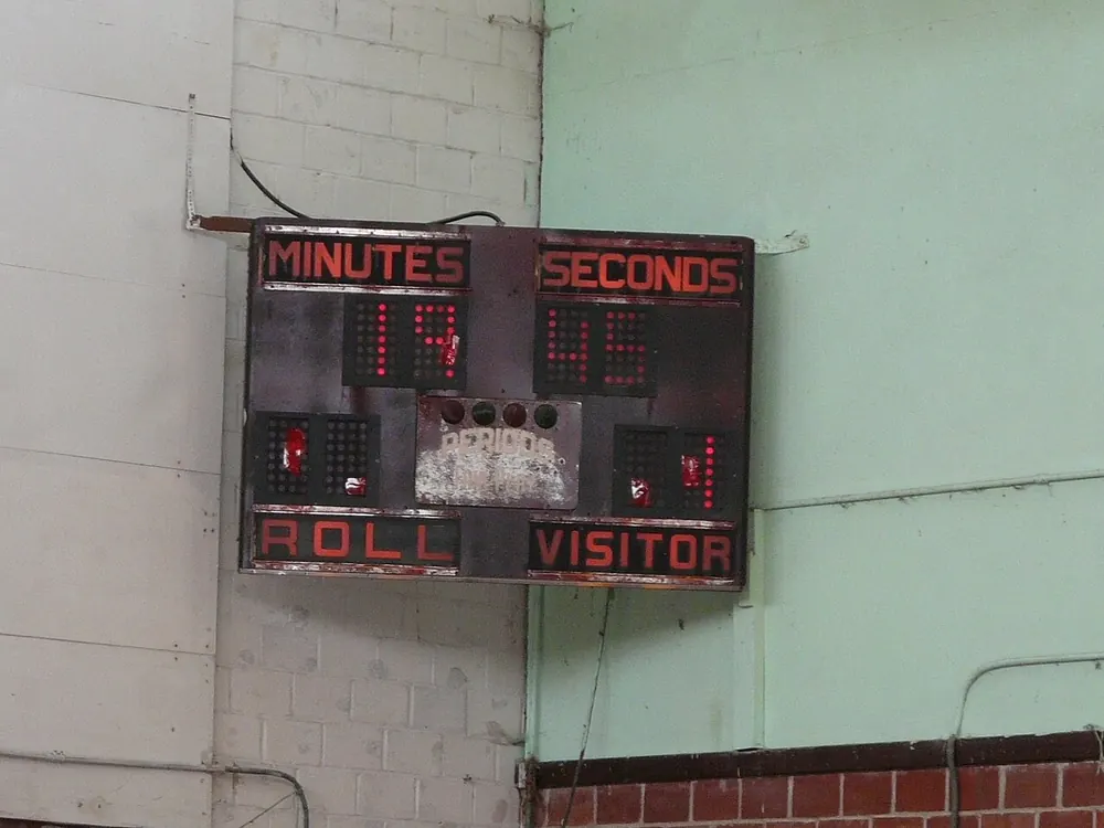 Basketball scoreboard showing home and visitor, illustrating uaap game lines - uaap betting site