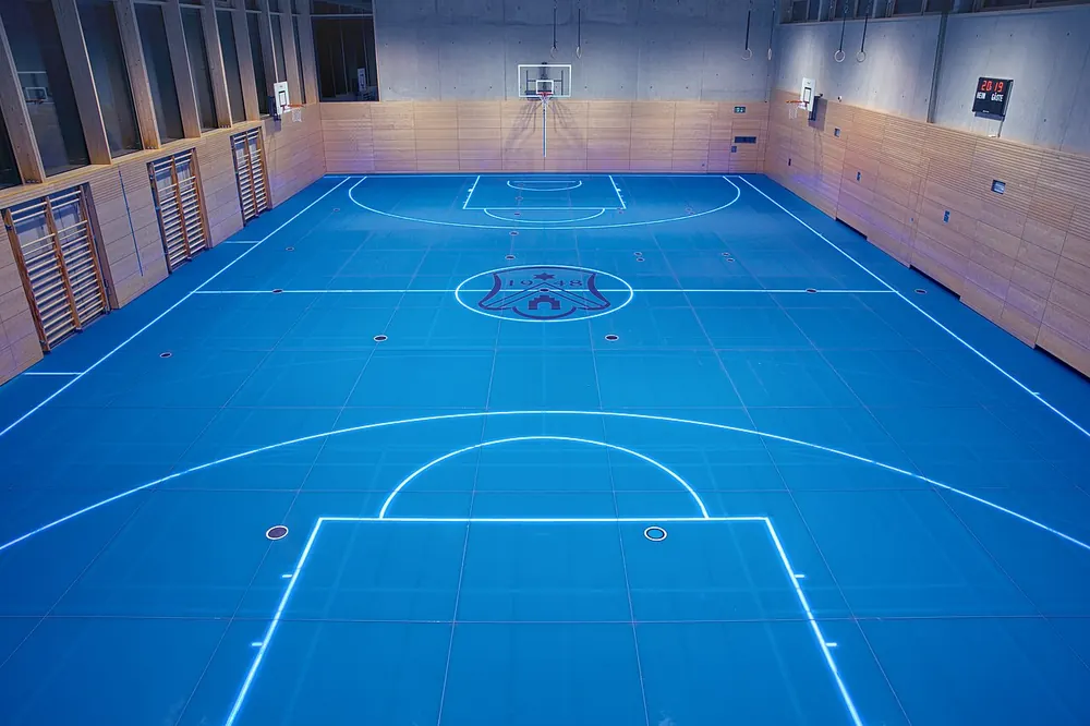 An empty blue indoor court floor - uaap volleyball betting