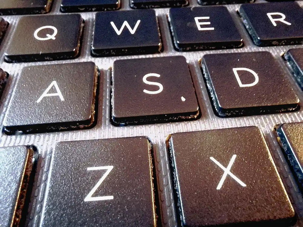 uaap volleyball betting site - close-up of laptop keyboard keys